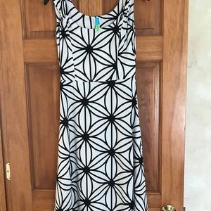 Black and off white dress/just below the knee